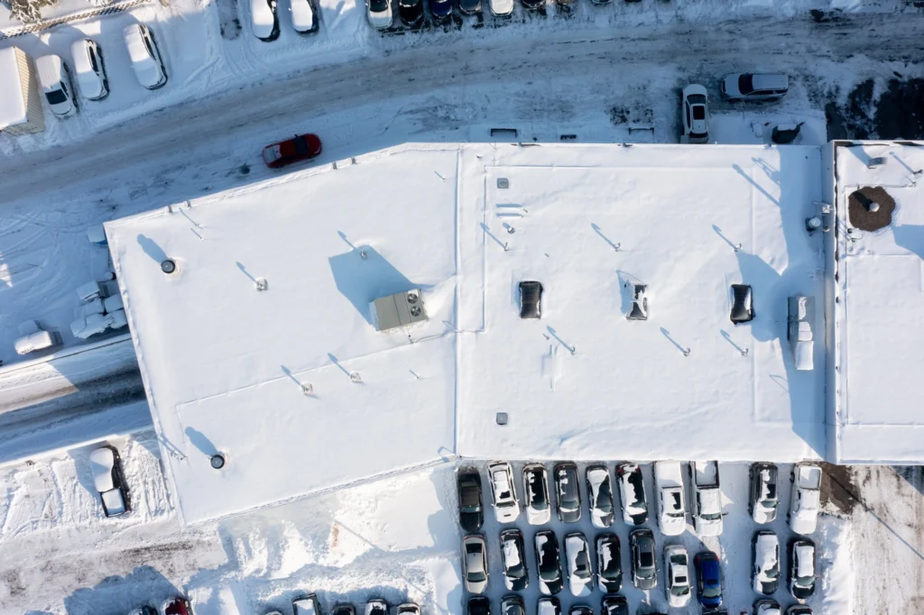 Snow and Ice Impact Flat Commercial Roofs
