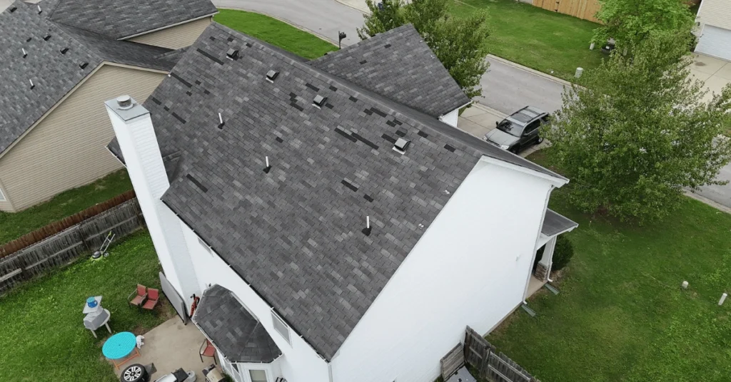 Storm-damaged asphalt shingle roof in Beltsville